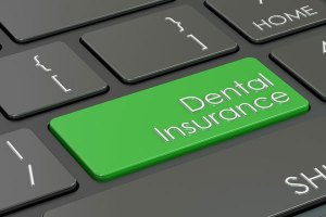 keyboard showing 'Dental Insurance' as one of the keys