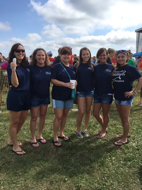 A photo of the Emmi Dental team in the 2017 Mud Run.