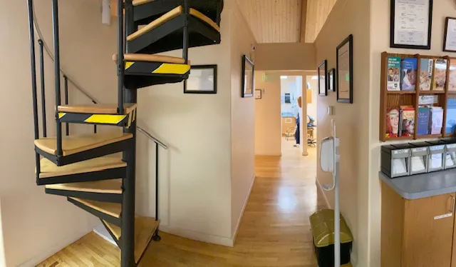 view of the hallway and spiral staircase