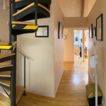 view of the hallway and spiral staircase