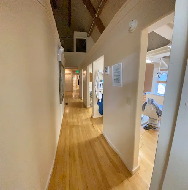 hallway and multiple rooms