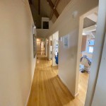 hallway and multiple rooms